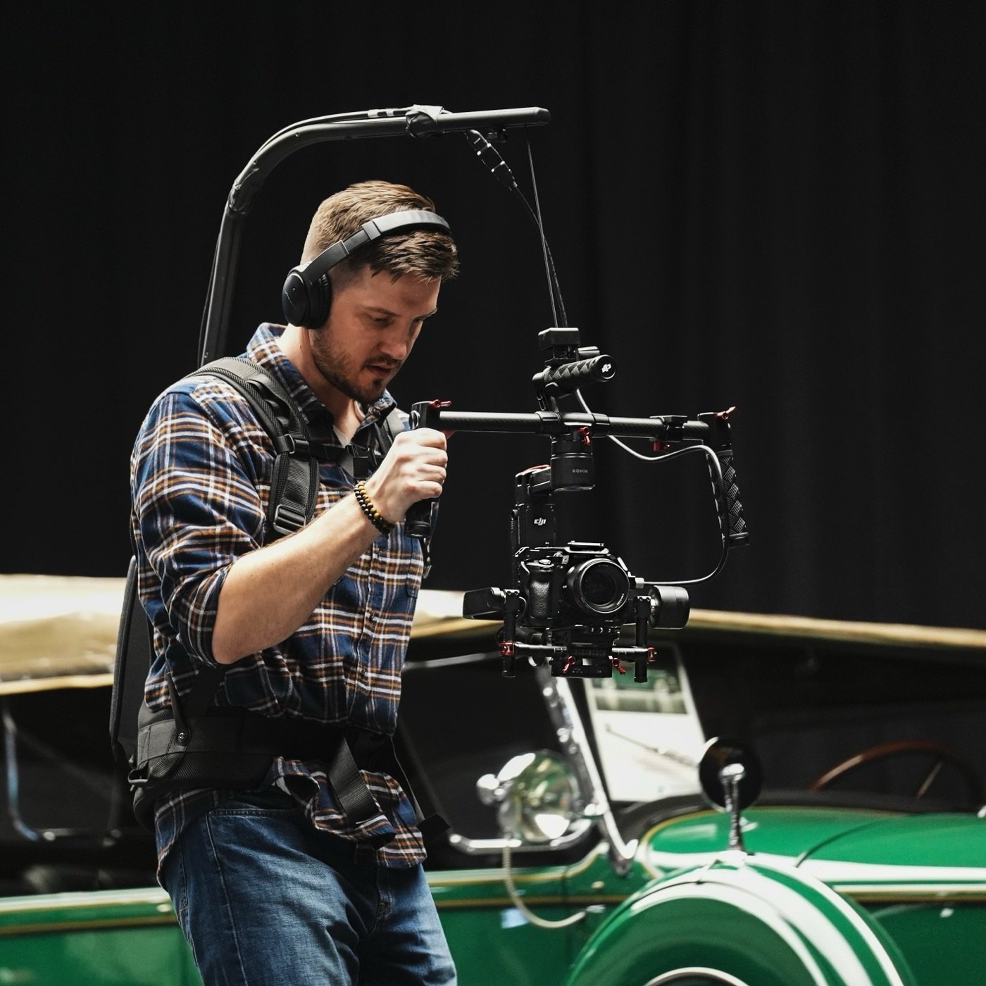 VideoHook founder Oleg Kovalov operating a cinema camera rig on set